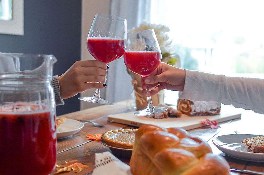 Two people toasting