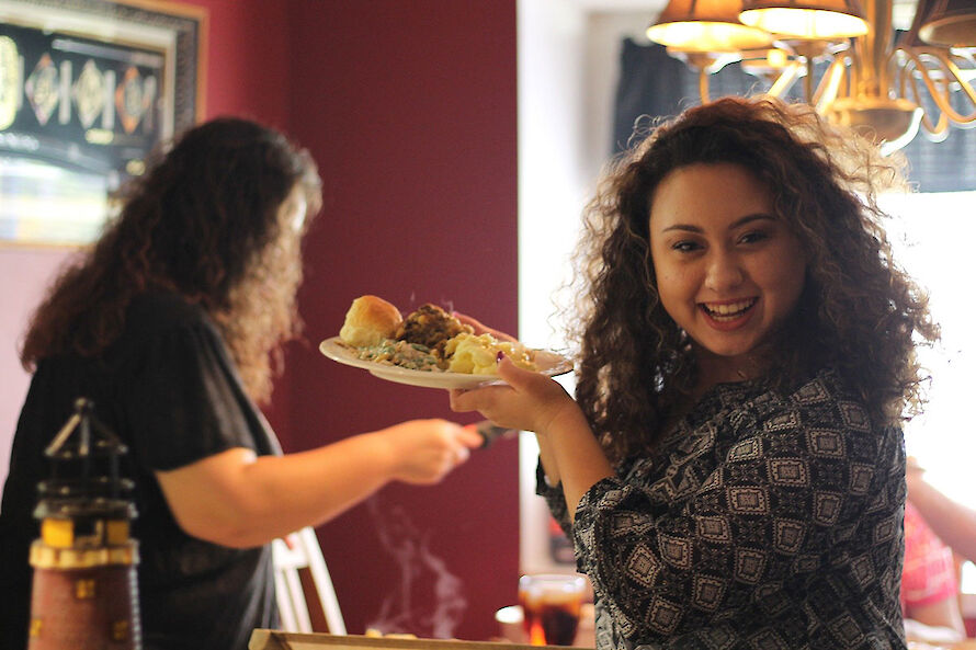 Smiling woman with food