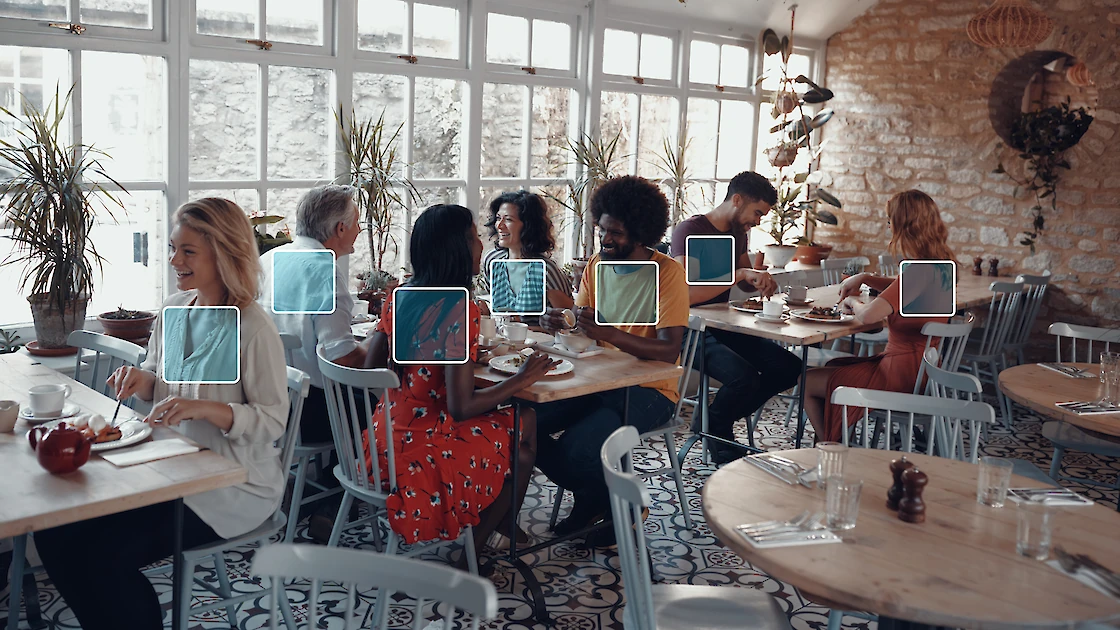 Guests at a restaurant being counted by AI.